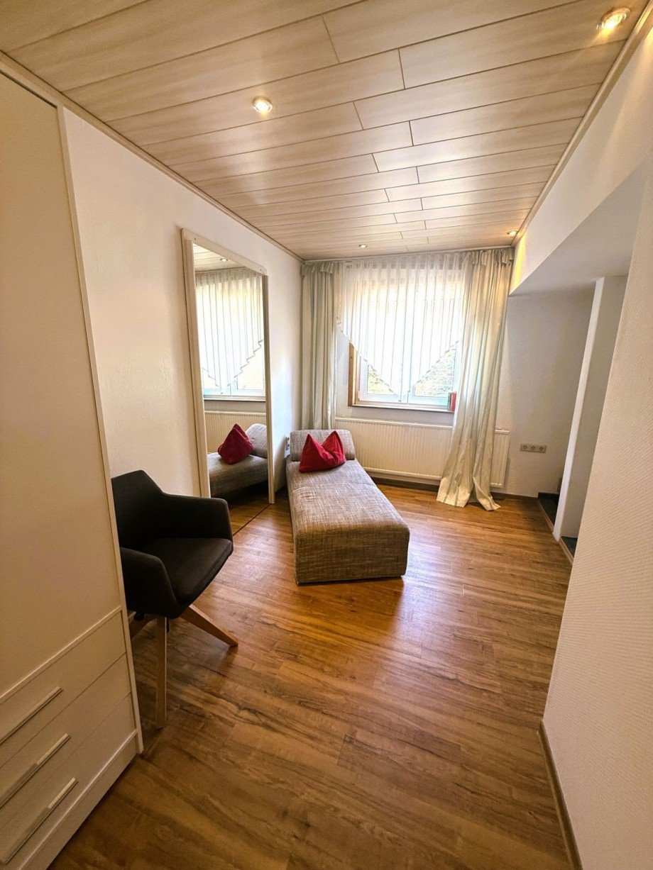 Helles Wohnzimmer mit Liege Freizeitimmobilie Masserberg