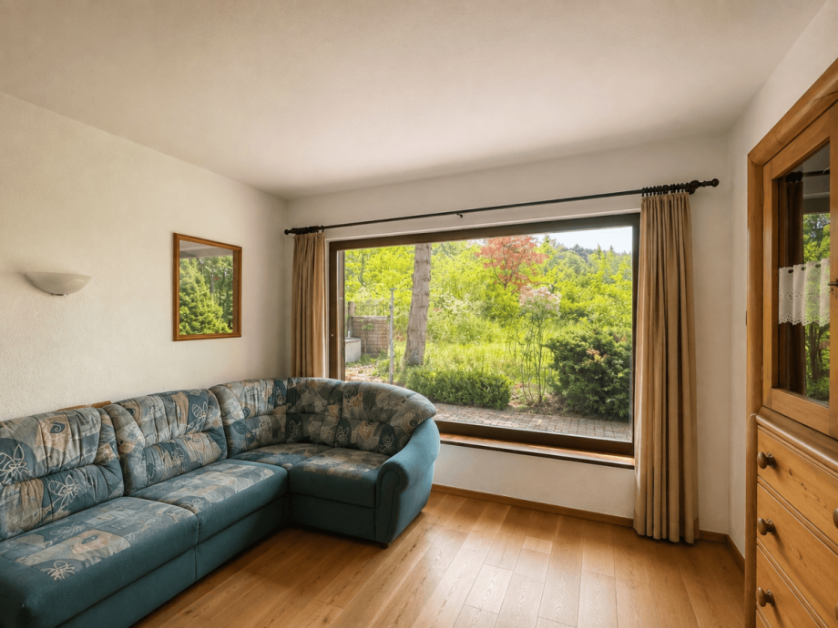 Wohnzimmer mit Gartenblick Bungalow Plaue