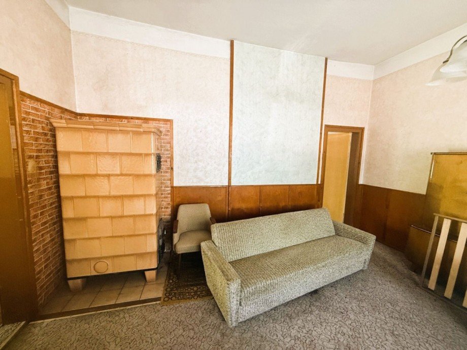 Wohnzimmer mit Ofen Reihenendhaus Gro�breitenbach