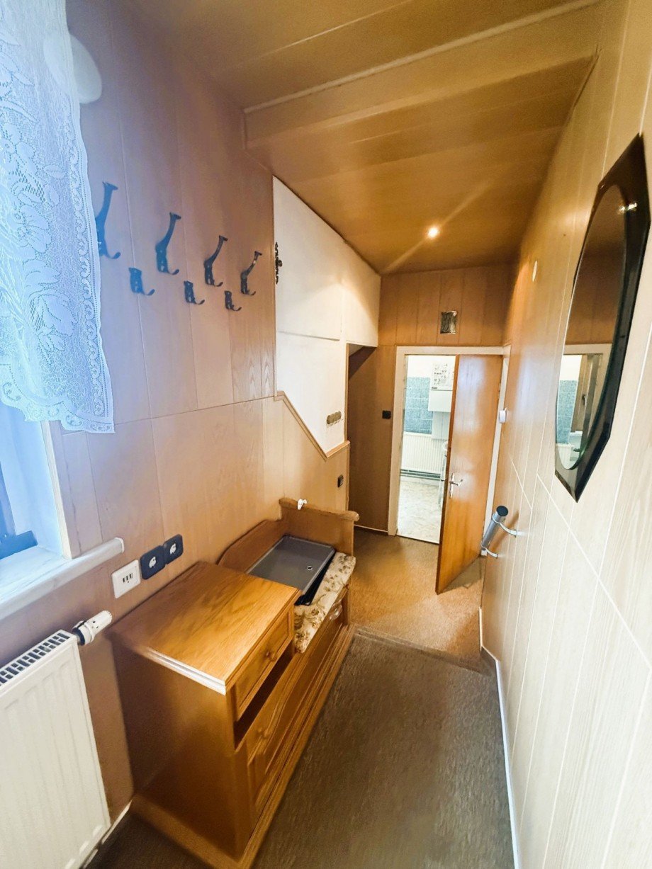 Eingangsbereich mit Holzdekor Mehrfamilienhaus Gro�breitenbach